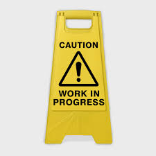 Caution Sign Work in Progress – Ensure Safety at Every Step